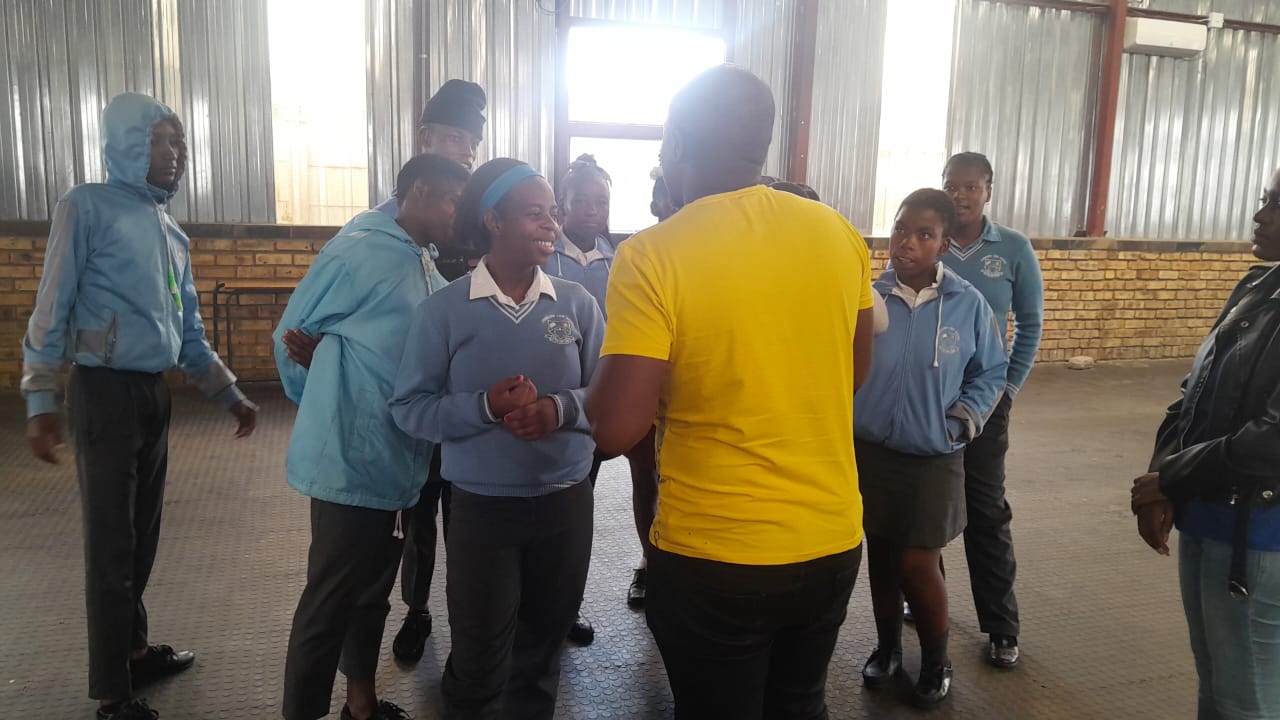 Young people engaged in a mentorship session