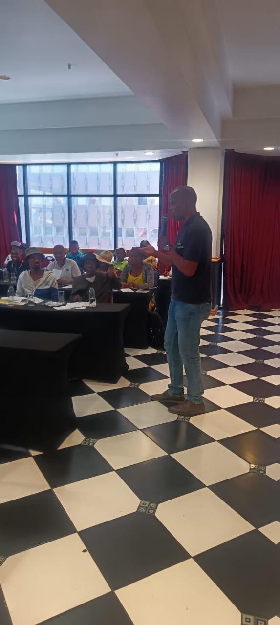 Workshop presenter speaking to participants