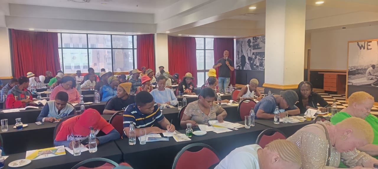 Workshop participants engaged in training